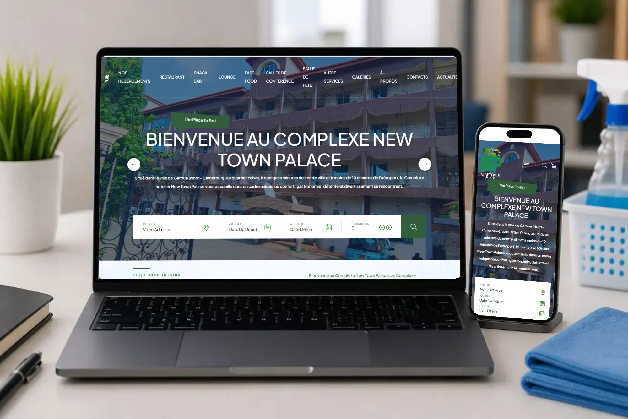 Newtown Palace — Website on a laptop and phone
